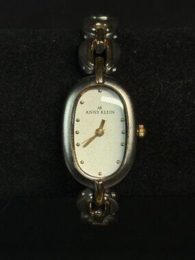 Anne Klein Women’s Quartz Watch Two Tone Silver Gold Oval Case 10/8081
